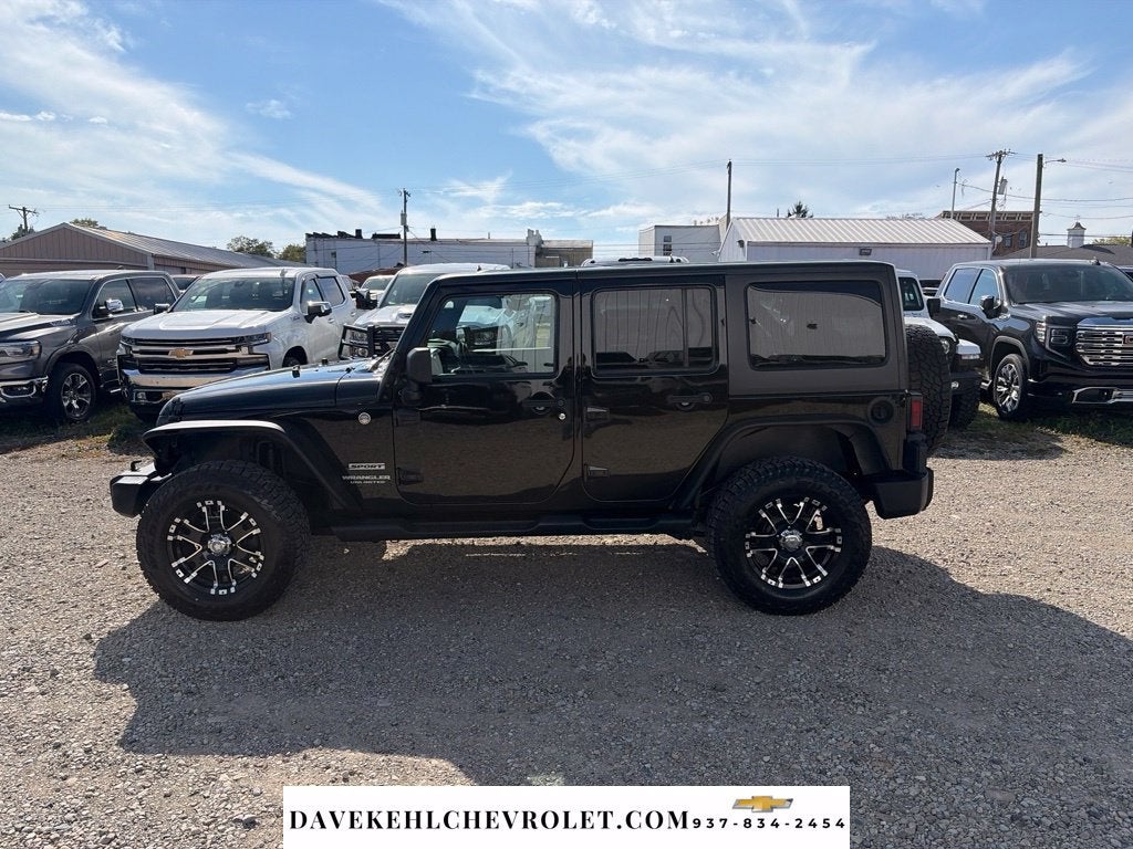 Used 2014 Jeep Wrangler Unlimited Sport with VIN 1C4BJWDGXEL115730 for sale in Mechanicsburg, OH